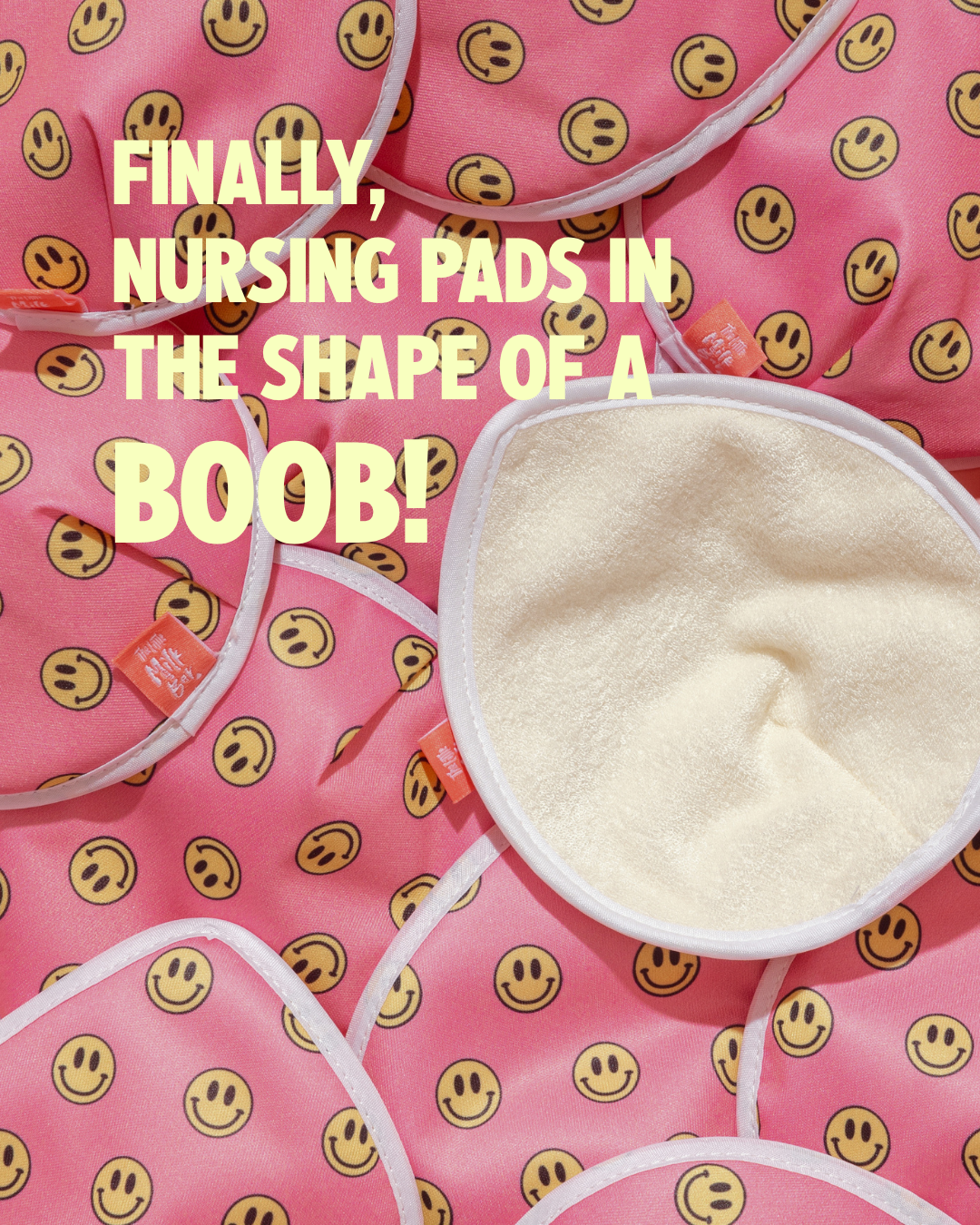 Teardrop-shaped reusable nursing pads with soft bamboo lining and smiley face print, shaped to fit your breast naturally